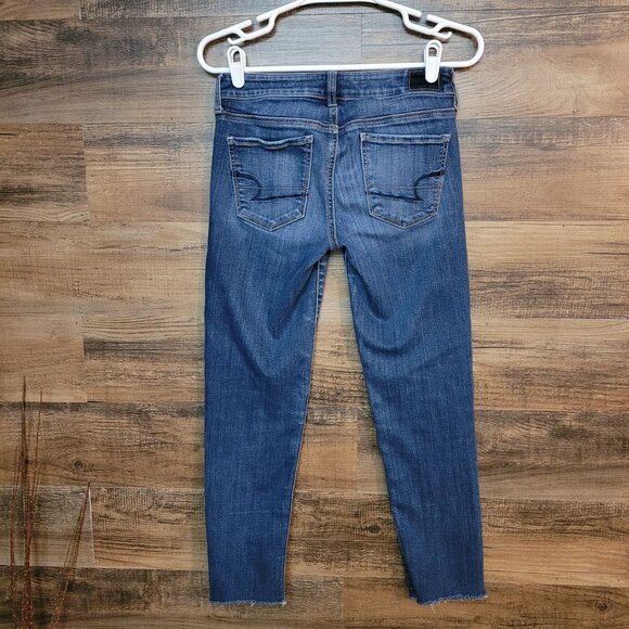 American Eagle Jeans 4 R Skinny Super Stretch Low Rise Raw Hem Medium Light - Picture 2 of 12